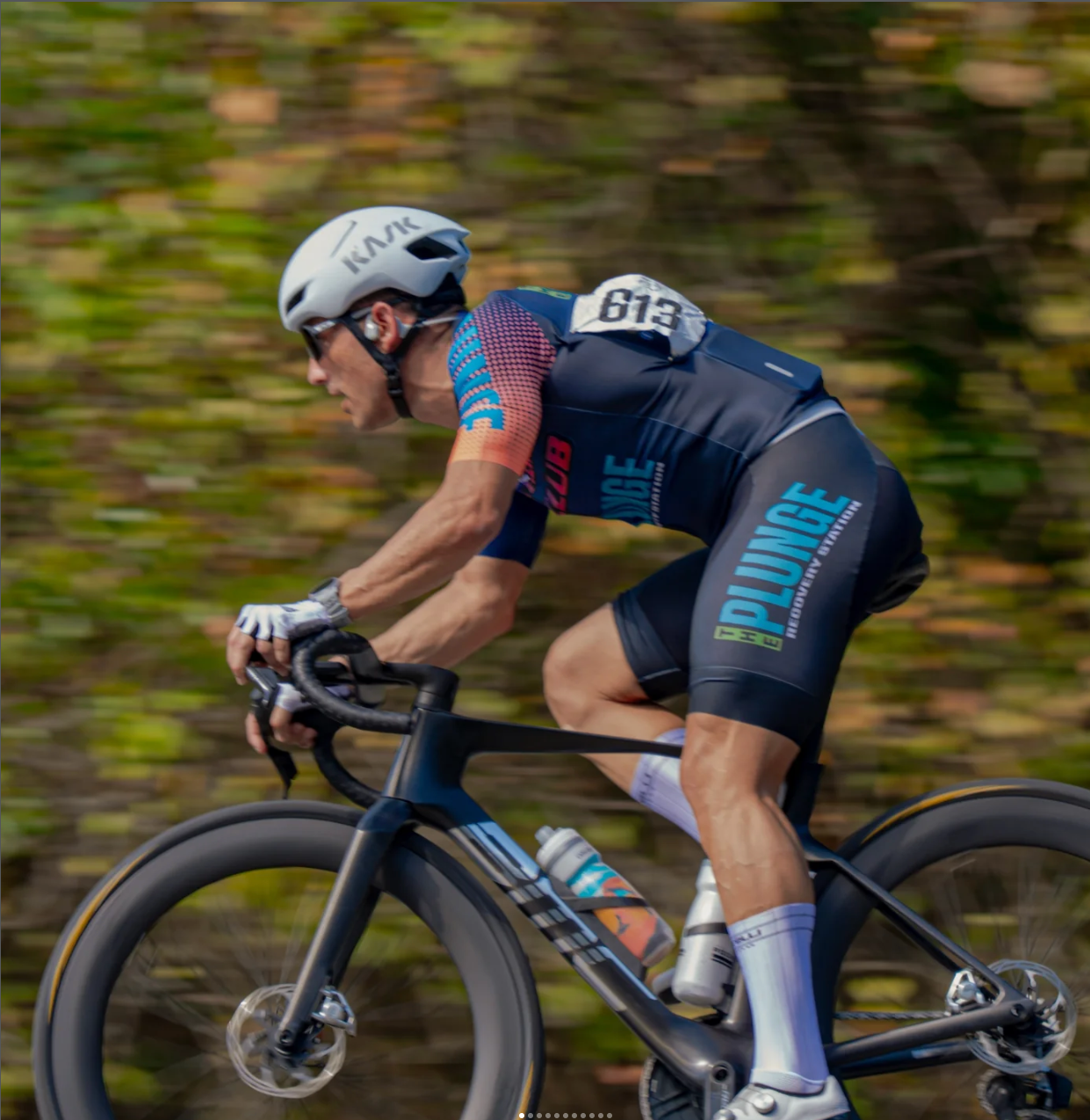 Awaken co-owner Jason cycling during a triathlon